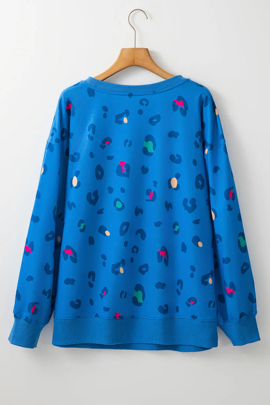 Sky Blue Leopard Ribbed Edge Drop Shoulder Pullover Sweatshirt - Chic Meadow Boutique