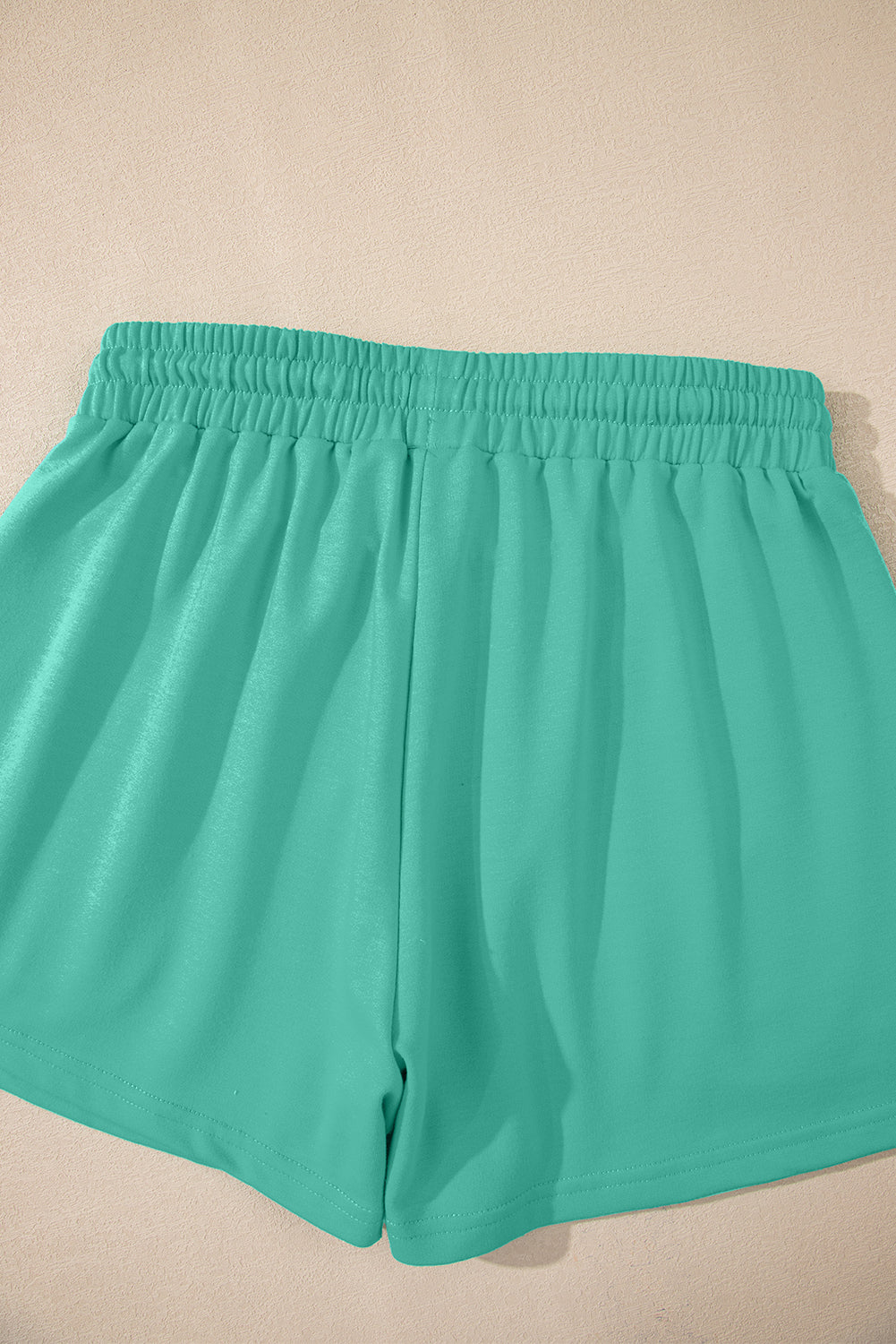 Sea Green Solid Loose V Neck Half Sleeve Tee and Shorts