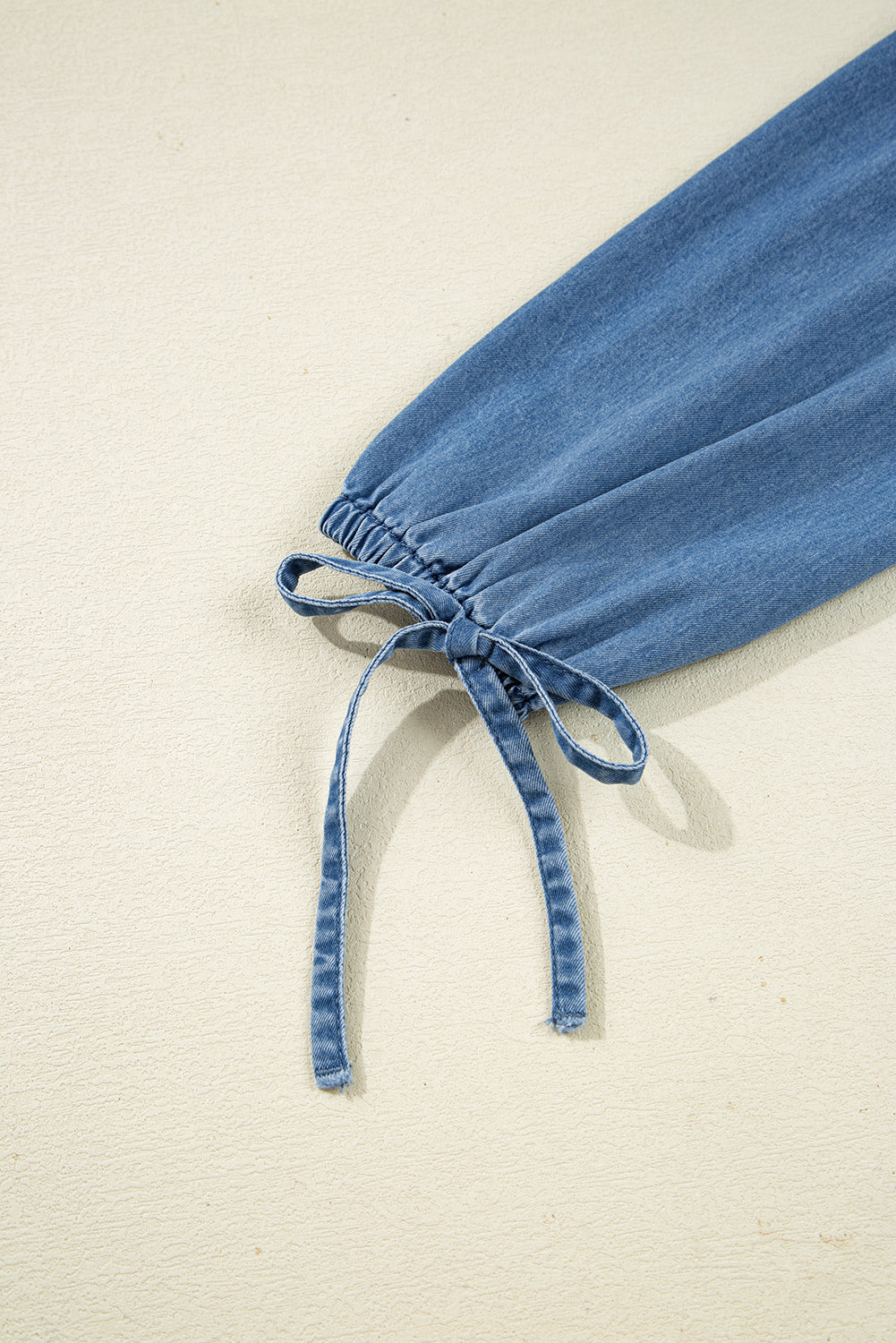 Dusk Blue Denim Lapel Neck Balloon Sleeve Tied Peplum Top