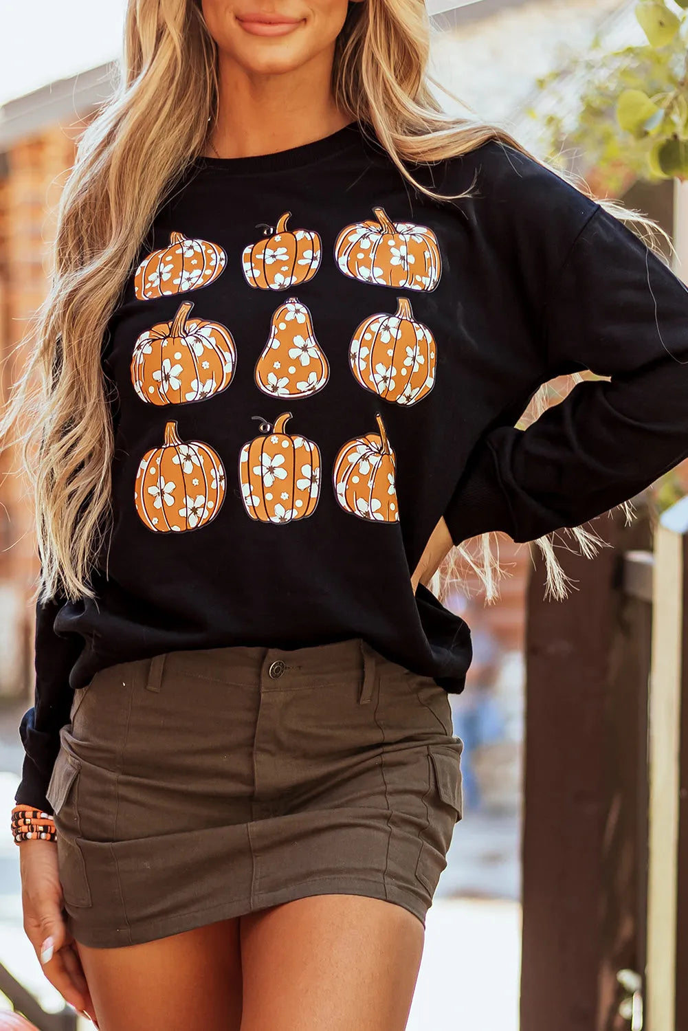 Black Floral Pumpkin Graphic Round Neck Halloween Sweatshirt - Chic Meadow Boutique 