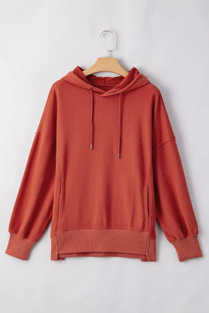 Red Clay Drop Shoulder Pocketed Baggy Drawstring Hoodie - Chic Meadow Boutique 