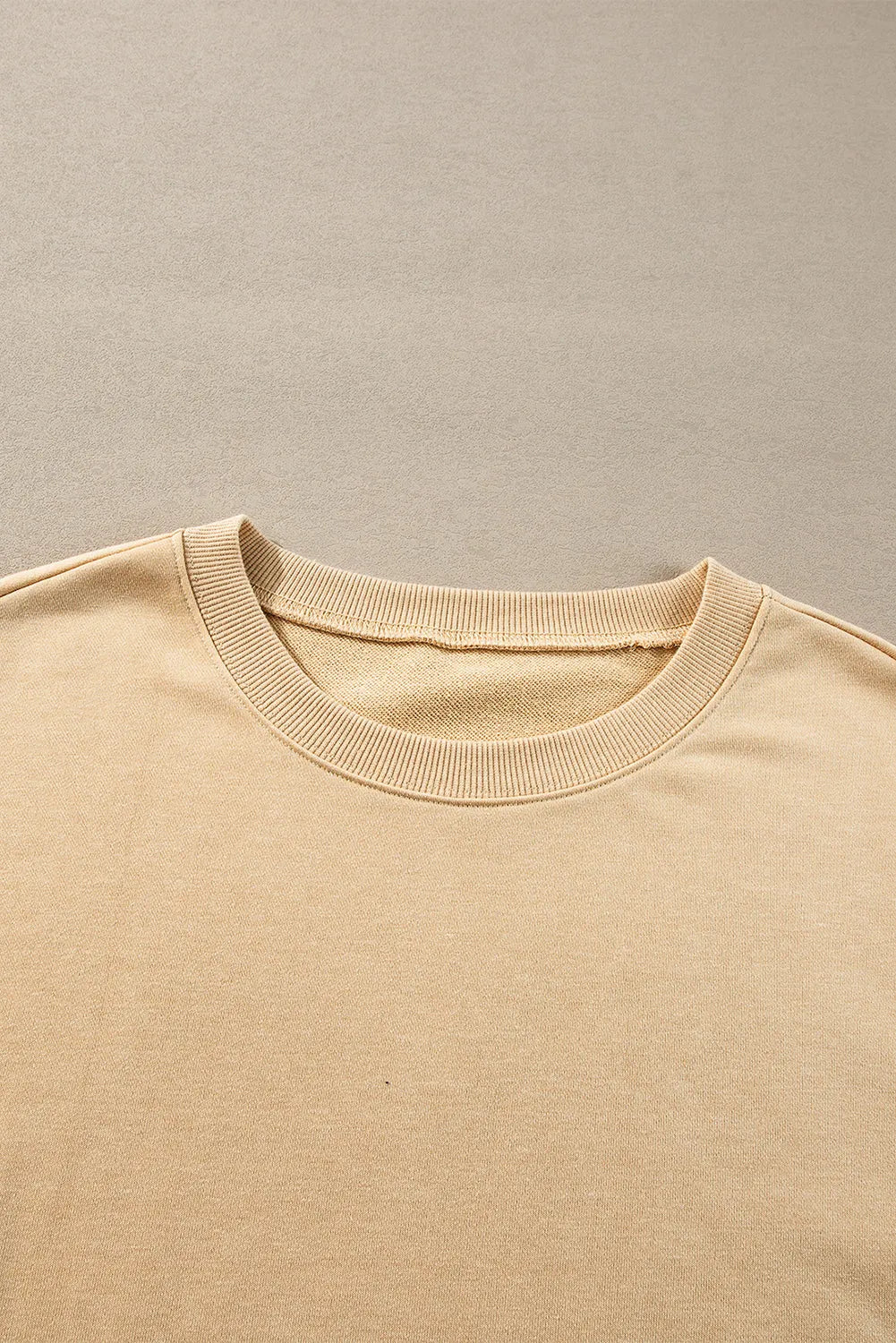 Light French Beige Exposed Seam Drop Shoulder Round Neck Sweatshirt with Slits - Chic Meadow Boutique 