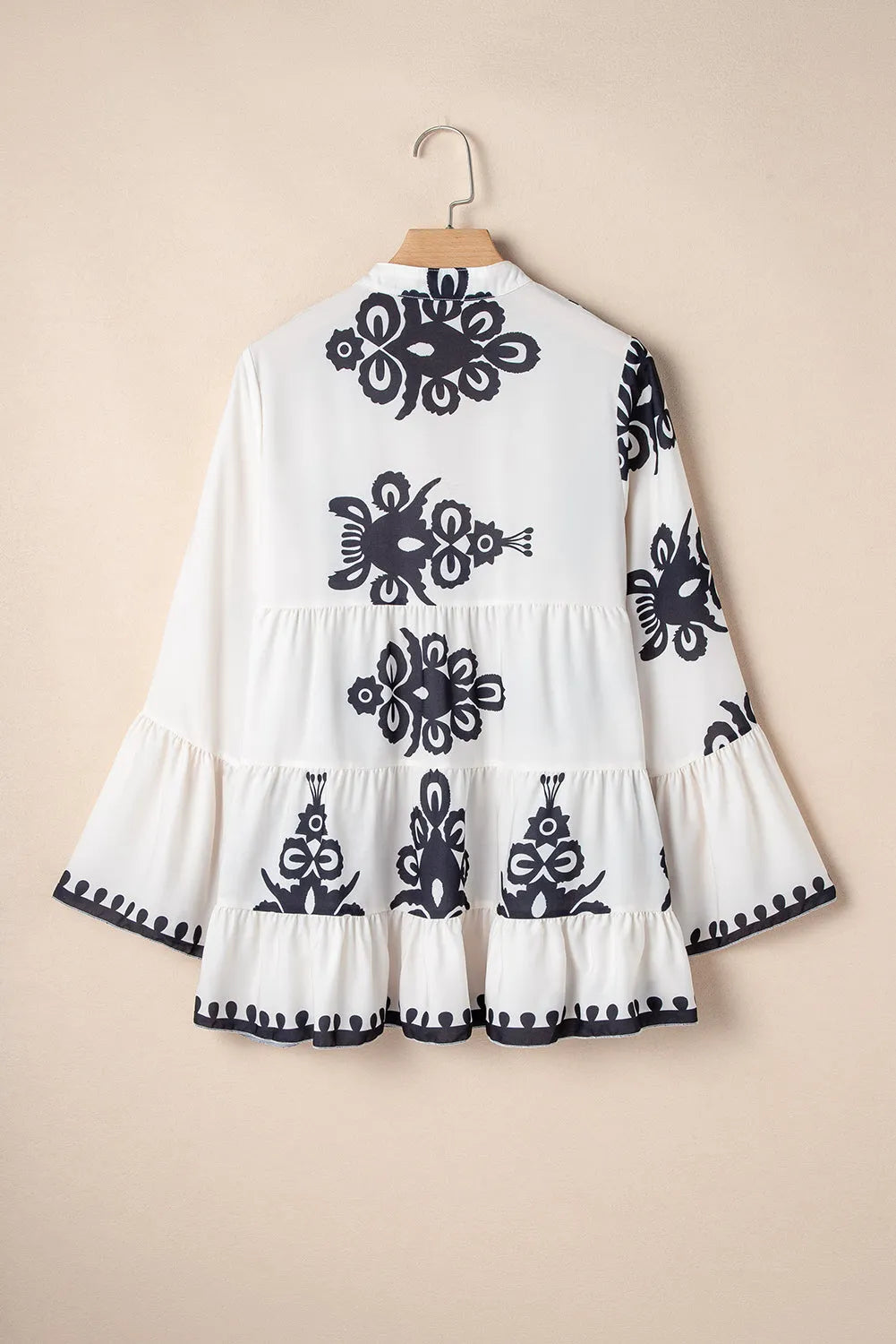 White Abstract Printed Bell Sleeve Buttoned Tiered Babydoll Blouse - Chic Meadow Boutique 