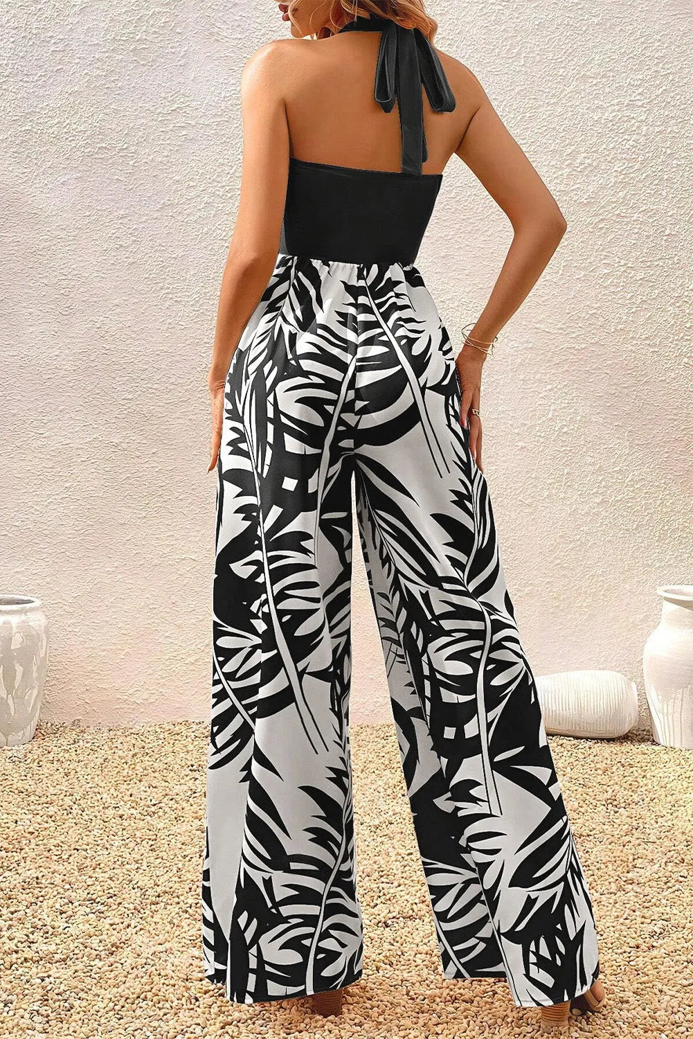 Black Halter Tropical Plant Print Wide Leg Jumpsuit - Chic Meadow Boutique 