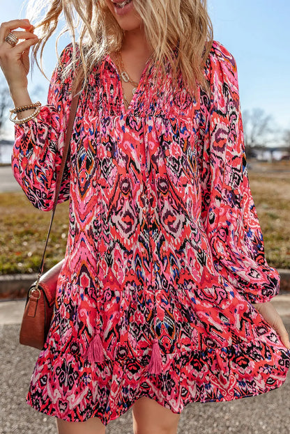 Rose Abstract Printed Tassel Tied Neck Long Sleeve Ruffled Mini Dress - Chic Meadow Boutique 