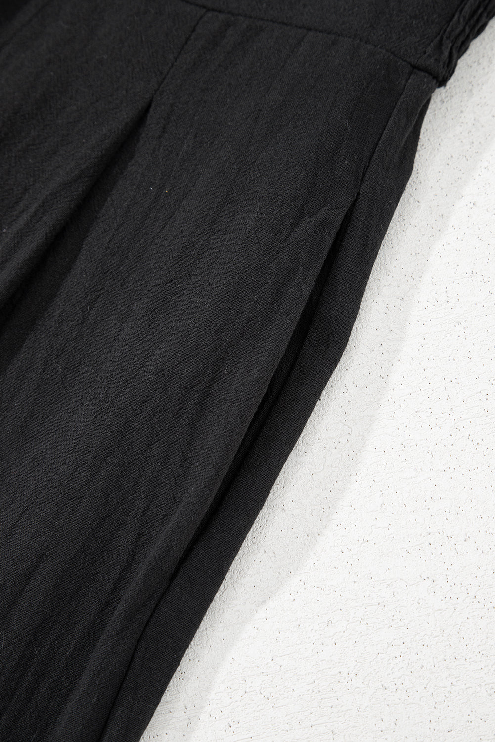 Black Front Cut Out Smocked Back Sleeveless Wide Leg Jumpsuit