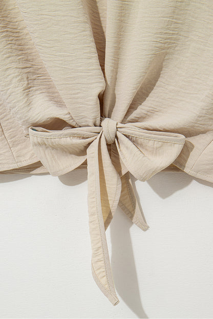 Parchment Solid Color Knotted Hem Short Sleeve Blouse