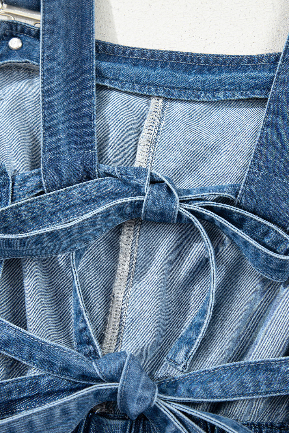 Sky Blue Buckle Straps Bib Style Drawstring Tied Backless Flared Denim Romper