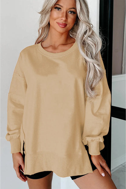 Light French Beige Exposed Seam Drop Shoulder Round Neck Sweatshirt with Slits - Chic Meadow Boutique 