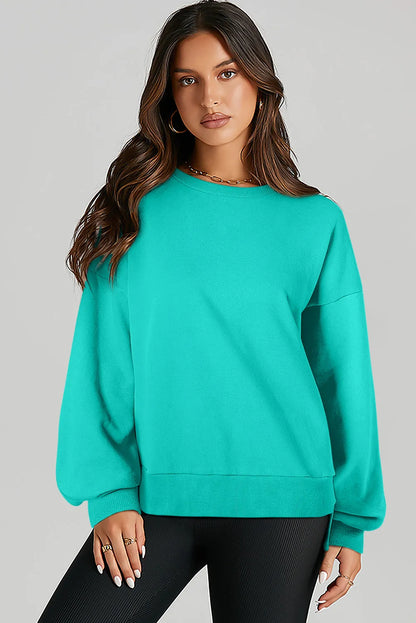 Aruba Blue Solid O Neck High Low Hem Pullover Sweatshirt - Chic Meadow Boutique 