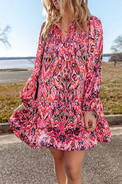 Rose Abstract Printed Tassel Tied Neck Long Sleeve Ruffled Mini Dress - Chic Meadow Boutique 