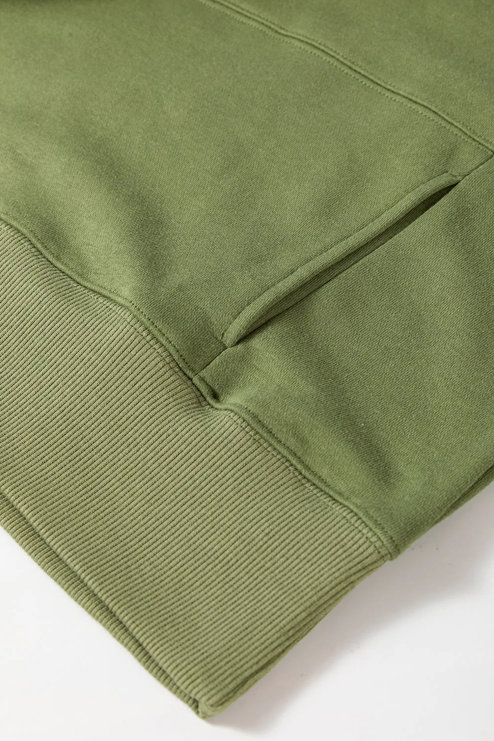 Vineyard Green Drop Shoulder Crisscross Stitching Pocketed Loose Sweatshirt - Chic Meadow Boutique 