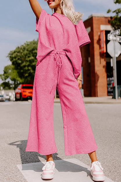 Strawberry Pink Textured Loose Fit T Shirt and Drawstring Pants Set - Chic Meadow Boutique 