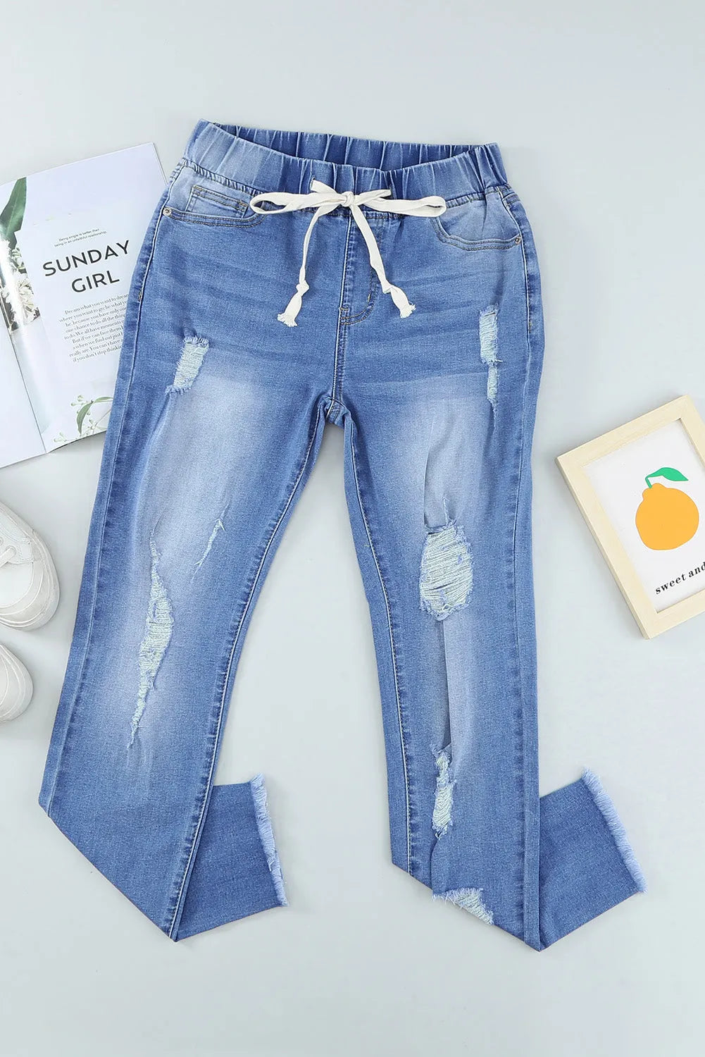 Sky Blue Drawstring Elastic Waist Hole Ripped Jeans - Chic Meadow Boutique 