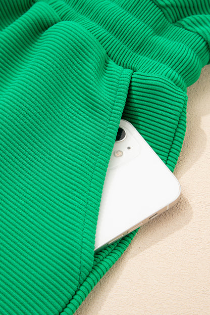 Bright Green Textured Short Sleeve Half Zip Drawstring Waist Romper