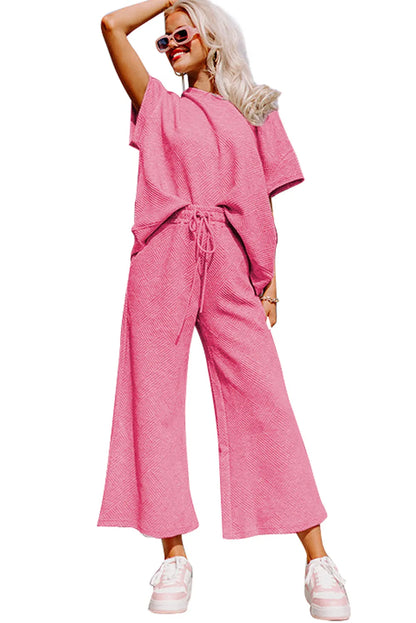 Strawberry Pink Textured Loose Fit T Shirt and Drawstring Pants Set - Chic Meadow Boutique 