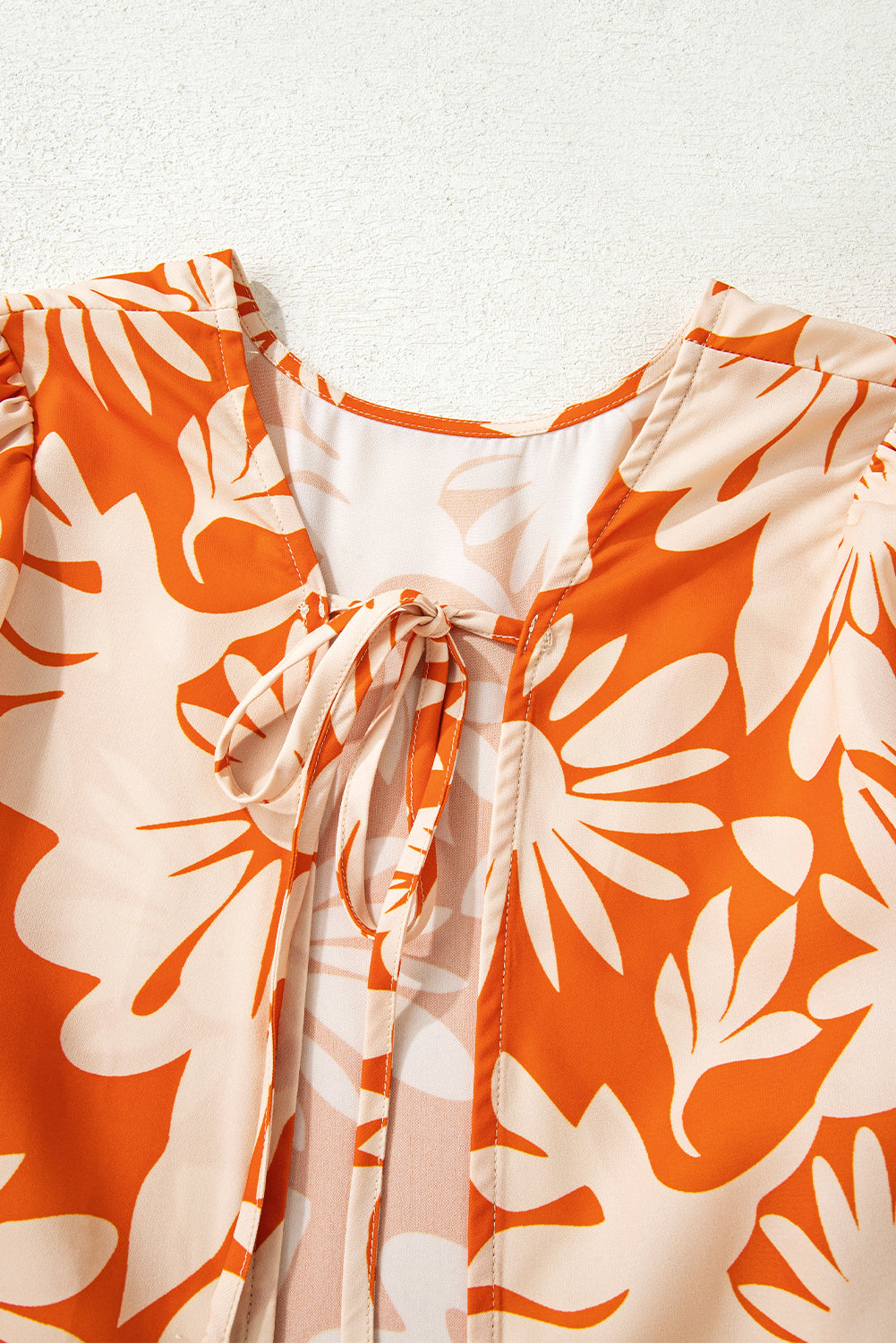 Orange Floral Print Knotted Open Back Long Sleeve Blouse