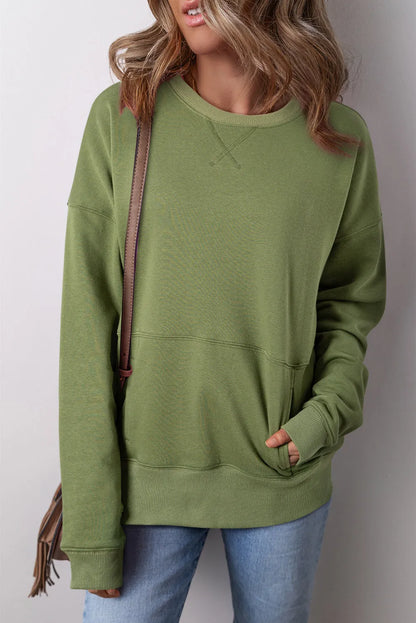 Vineyard Green Drop Shoulder Crisscross Stitching Pocketed Loose Sweatshirt - Chic Meadow Boutique 