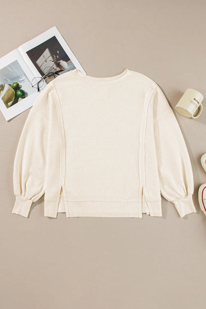 White Waffle Knit Bishop Sleeve Split Oversized Sweatshirt - Chic Meadow Boutique 