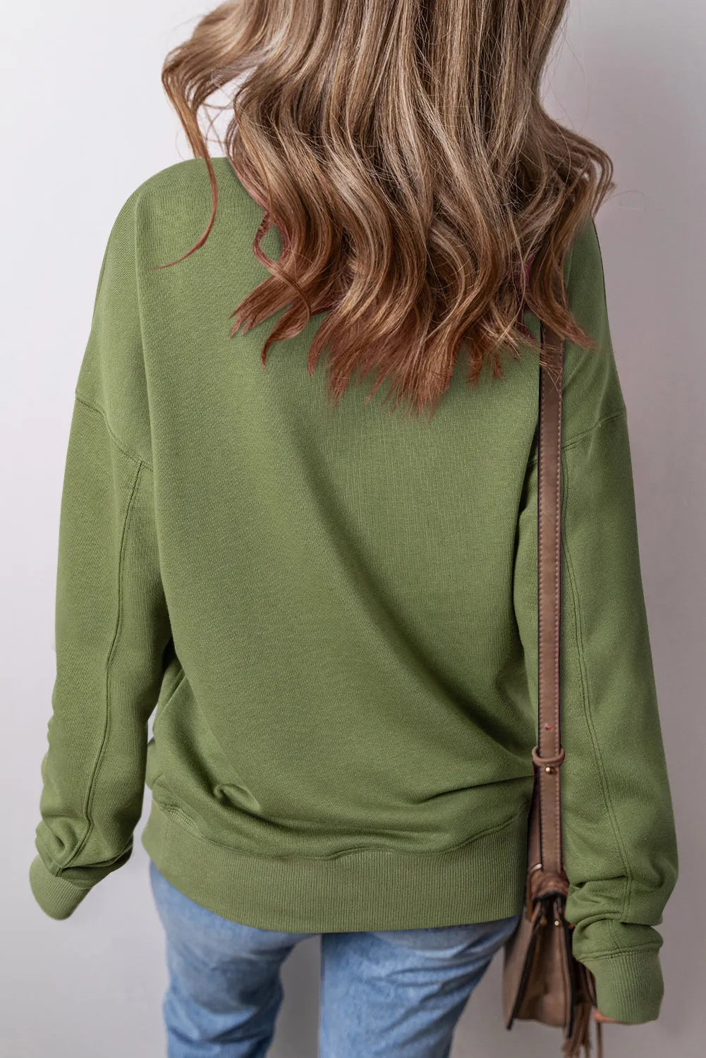 Vineyard Green Drop Shoulder Crisscross Stitching Pocketed Loose Sweatshirt - Chic Meadow Boutique 