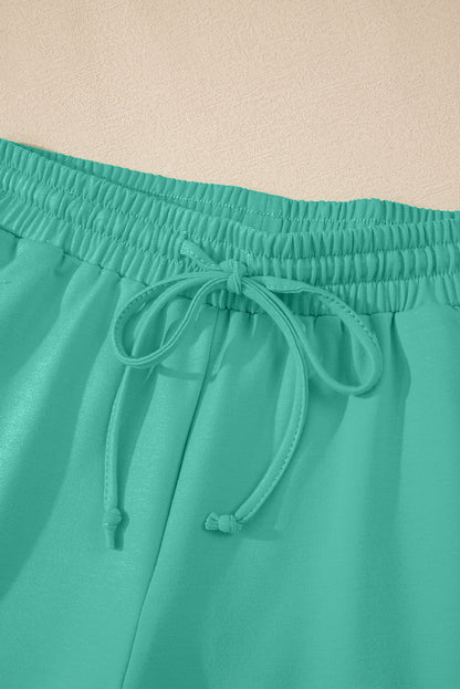 Sea Green Solid Loose V Neck Half Sleeve Tee and Shorts