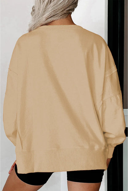 Light French Beige Exposed Seam Drop Shoulder Round Neck Sweatshirt with Slits - Chic Meadow Boutique 