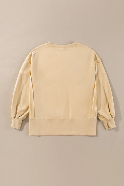 Light French Beige Exposed Seam Drop Shoulder Round Neck Sweatshirt with Slits - Chic Meadow Boutique 