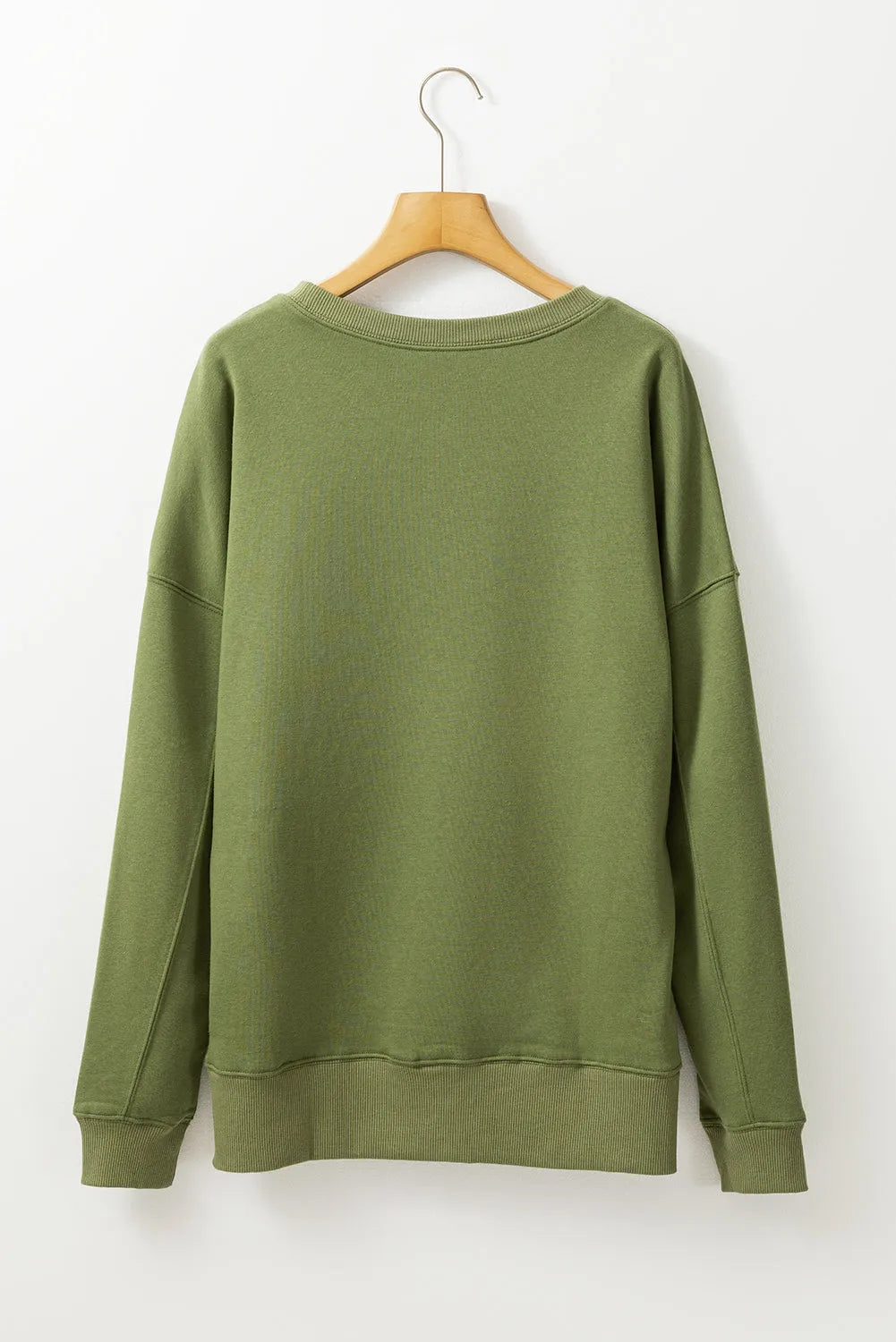 Vineyard Green Drop Shoulder Crisscross Stitching Pocketed Loose Sweatshirt - Chic Meadow Boutique 