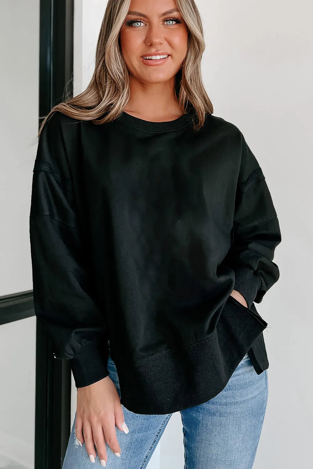 Black Exposed Seam Drop Shoulder Round Neck Sweatshirt with Slits - Chic Meadow Boutique 