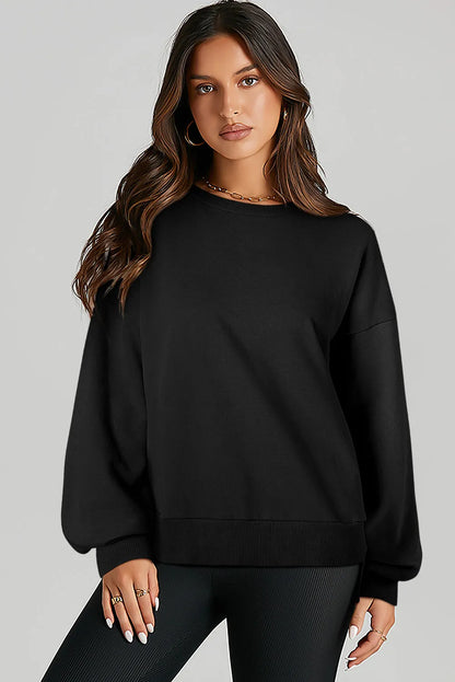 Black Solid O Neck High Low Hem Pullover Sweatshirt - Chic Meadow Boutique 