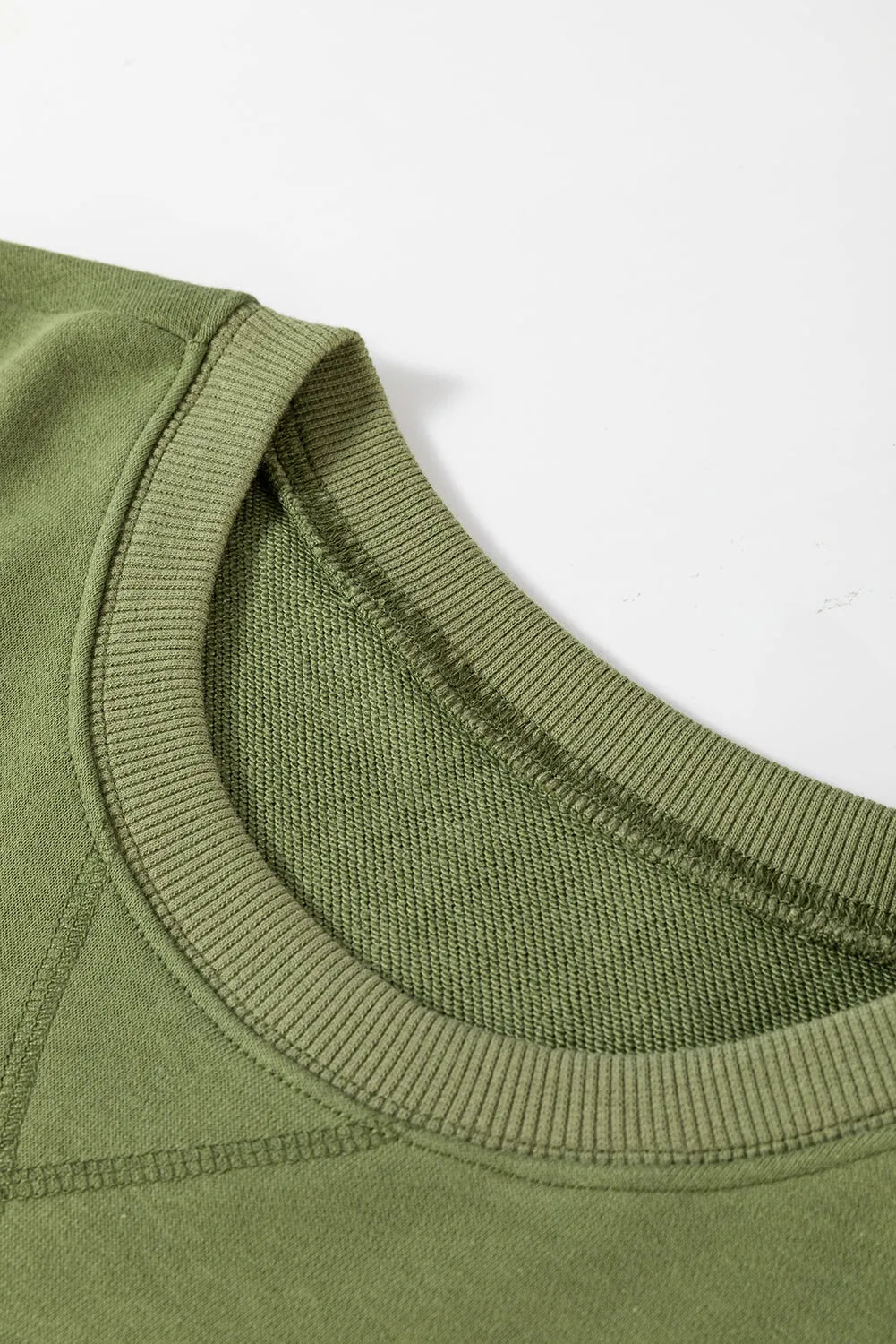 Vineyard Green Drop Shoulder Crisscross Stitching Pocketed Loose Sweatshirt - Chic Meadow Boutique 