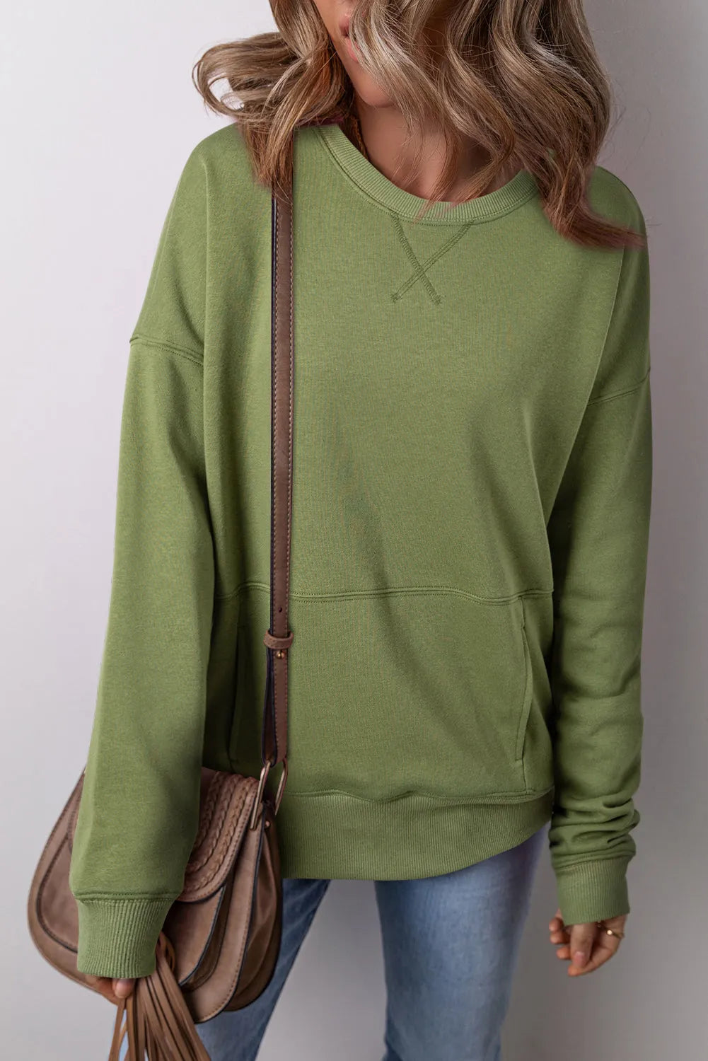 Vineyard Green Drop Shoulder Crisscross Stitching Pocketed Loose Sweatshirt - Chic Meadow Boutique 