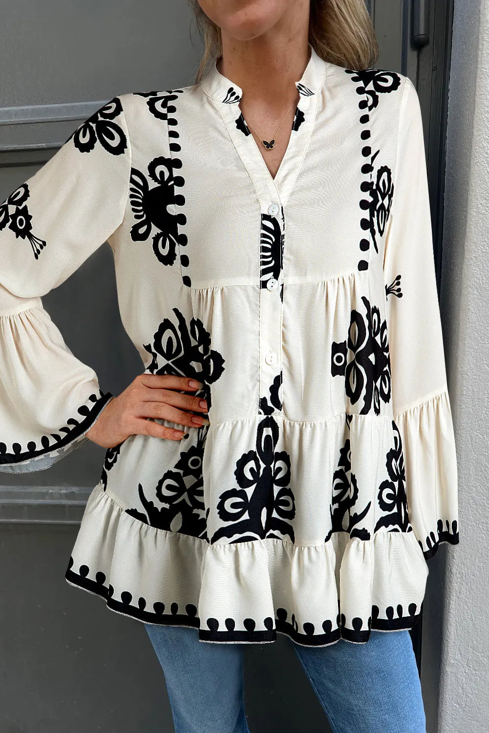 White Abstract Printed Bell Sleeve Buttoned Tiered Babydoll Blouse - Chic Meadow Boutique 