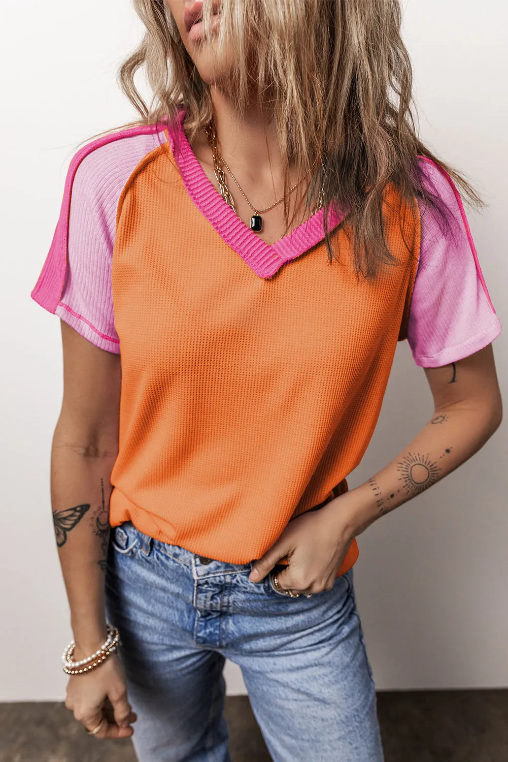 Orange Exposed Seam Color Block Knitted V Neck T-shirt - Chic Meadow Boutique 