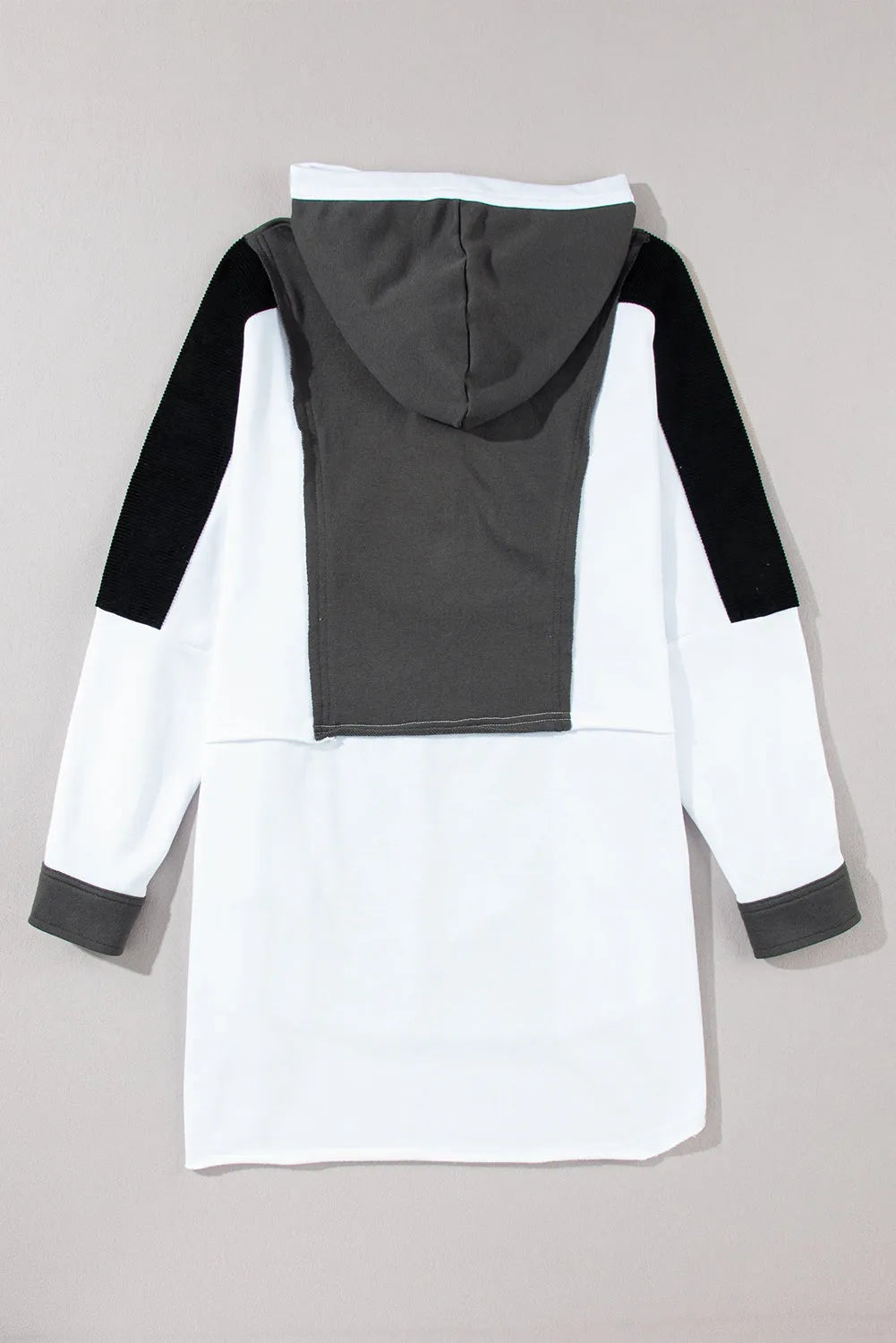 Black Color Block Exposed Seam Buttoned Neckline Hoodie - Chic Meadow Boutique 