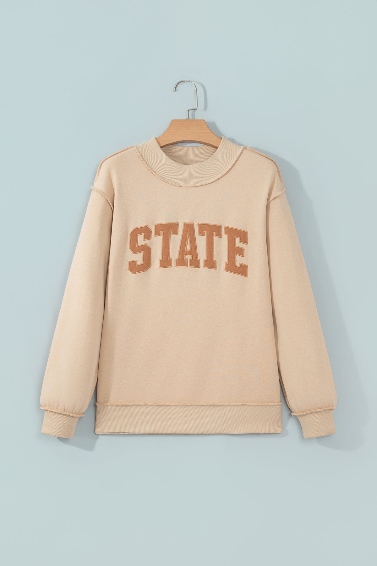Parchment Exposed Seam Mock Neck STATE Letter Graphic Loose Sweatshirt