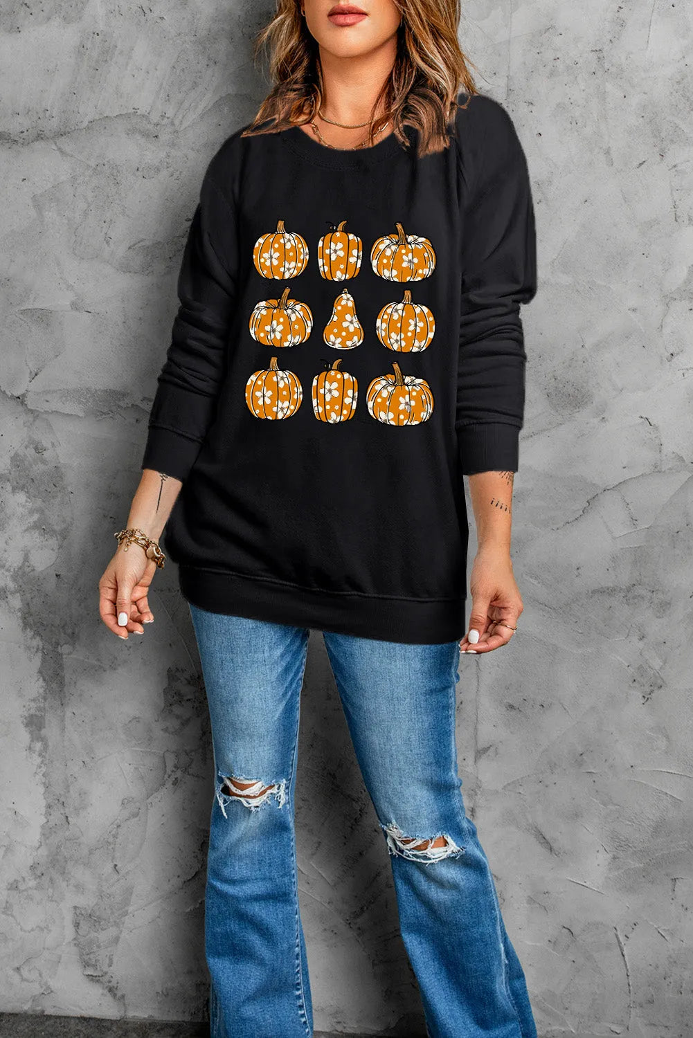 Black Floral Pumpkin Graphic Round Neck Halloween Sweatshirt - Chic Meadow Boutique 