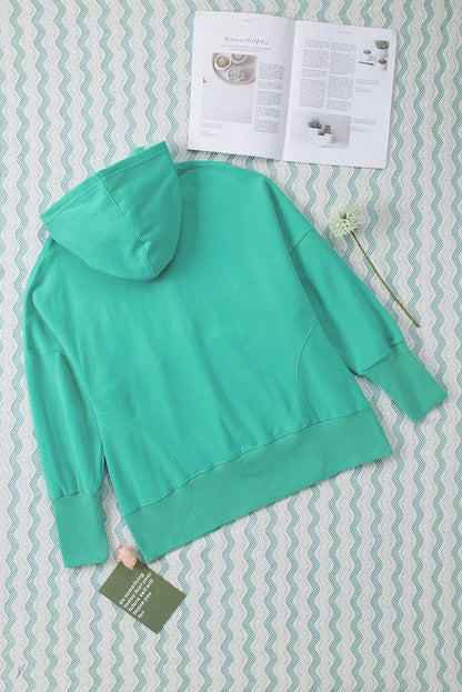 Turquoise Batwing Sleeve Pocketed Henley Hoodie - Chic Meadow Boutique 