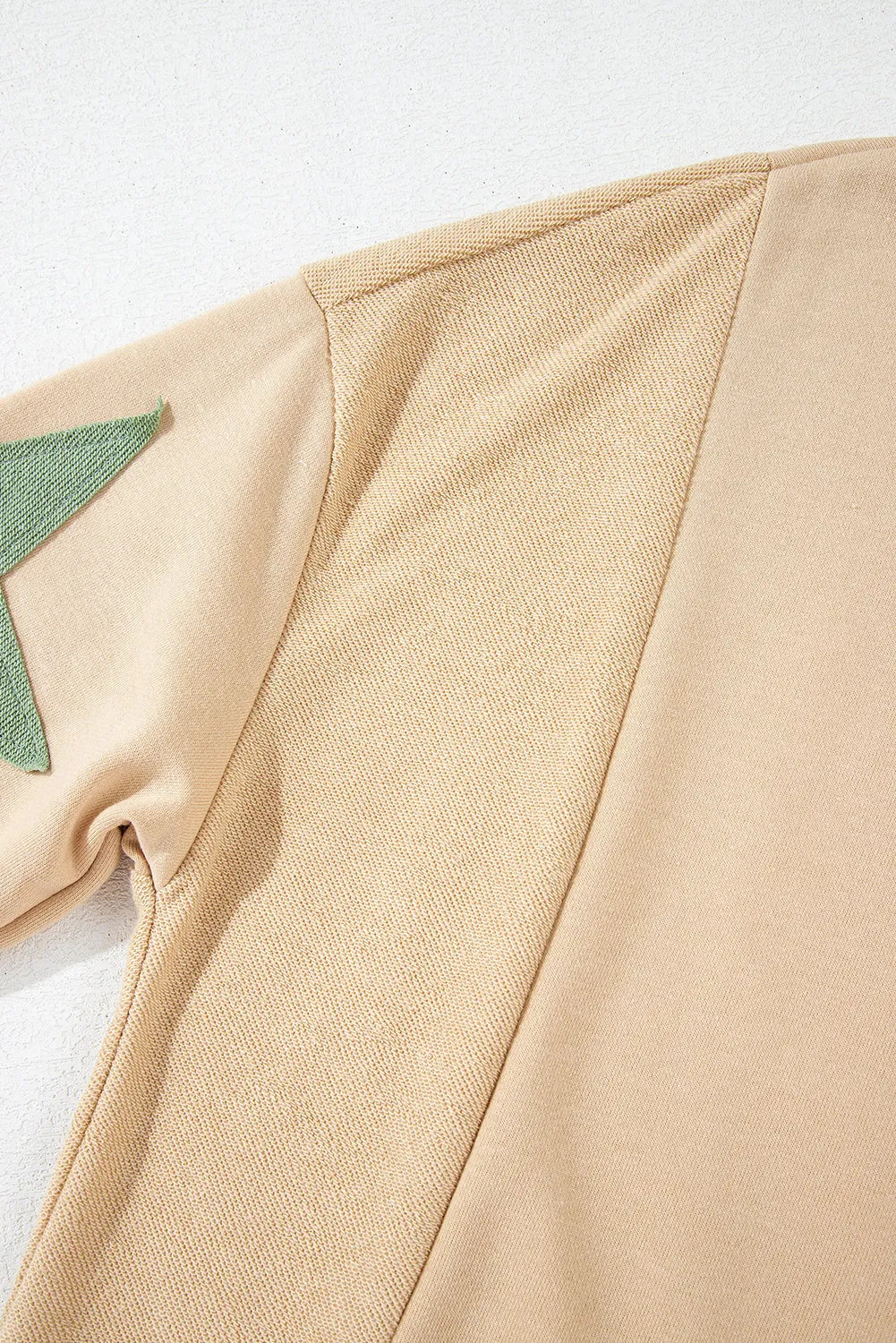 Parchment Star Patchwork Exposed Seam Oversized Sweatshirt - Chic Meadow Boutique 