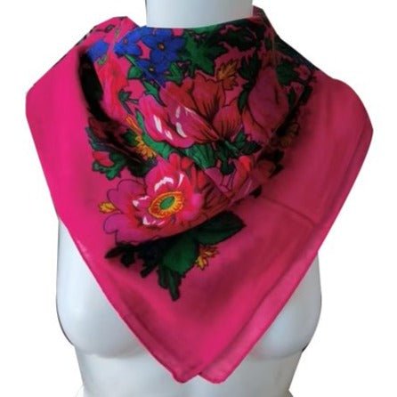 Elegant pink floral scarf with intricate blue, green and pink flower patterns