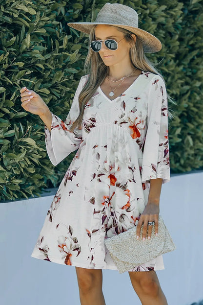 White Boho 3/4 Sleeve Floral Dress with V Neckline - Chic Meadow Boutique 